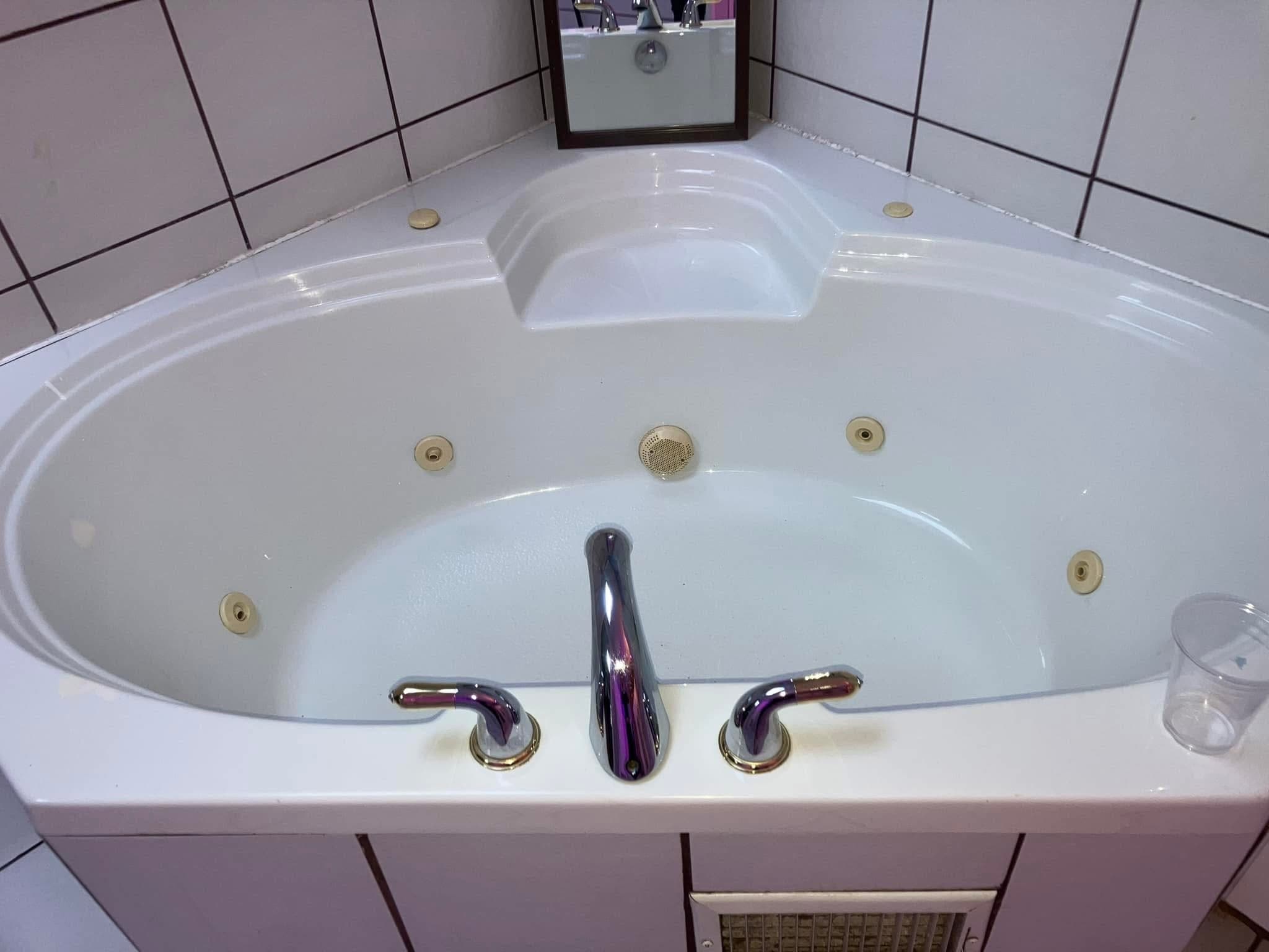 Sparkling clean jacuzzi tub with polished fixtures