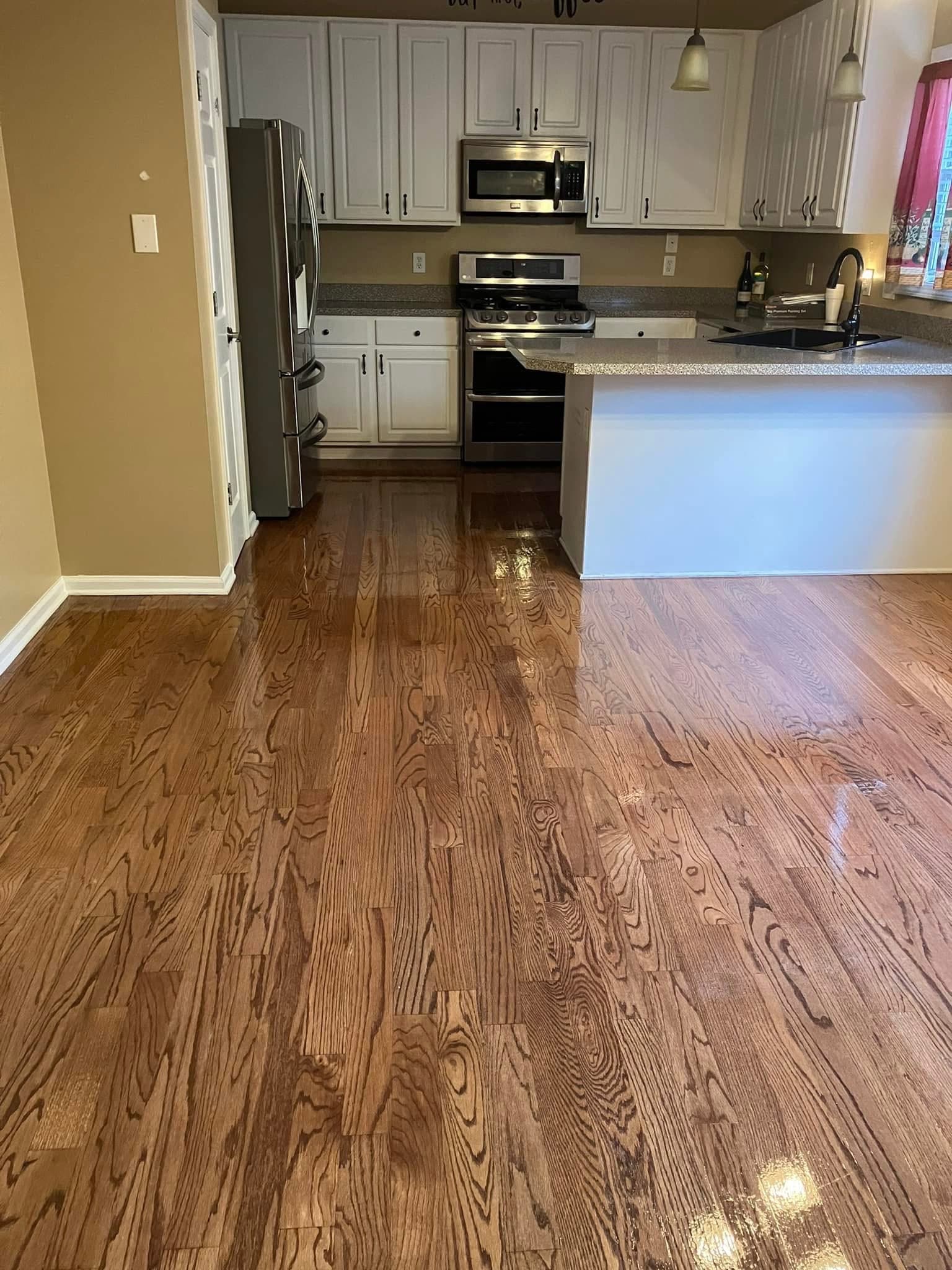 Gleaming hardwood floors in a freshly cleaned kitchen